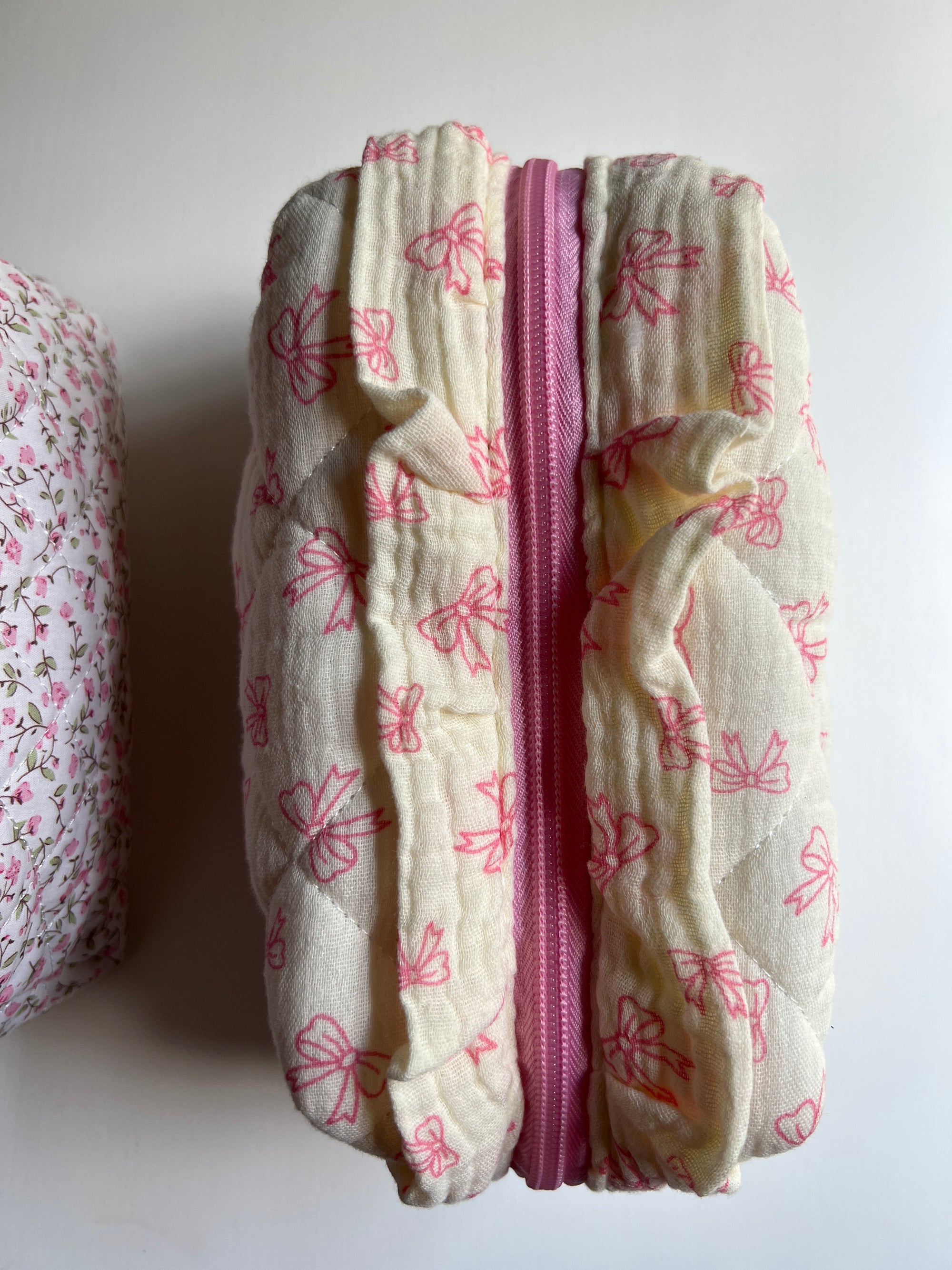 Pink bow makeup bag